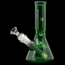 The "Crown Jewel" Emerald Green Beaker Bong by LA Pipes is handmade in Los Angeles from borosilicate glass, featuring a straight neck, wide base, and angled removable downstem and bowl. Shown against a solid black background.