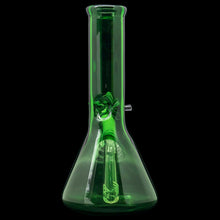 The "Crown Jewel" Emerald Green Beaker Bong by LA Pipes is handmade in Los Angeles from borosilicate glass, featuring a wide base, cylindrical neck, and angled downstem and bowl. Shown against a black background.