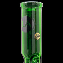 Close-up of the "Crown Jewel" Emerald Green Beaker Bong, handmade by LA Pipes in Los Angeles, featuring a black logo and round gold "Made in USA" sticker, set against a plain black background.