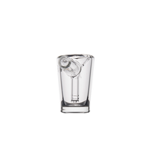 The MJ Arsenal Basin Bubbler is a clear borosilicate glass shot glass with an angled side tube, resembling a mini bubbler, shown on a plain white background.
