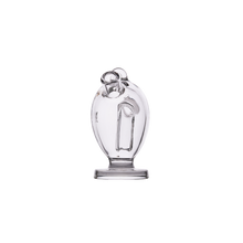 A clear glass vase with a rounded body, wide flat base, and abstract looped top echoes the sleek style of the MJ Arsenal The Martian® Original Blunt Bubbler™, showcasing artistic design and smooth water filtration against a plain white background.