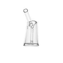 The MJ Arsenal Fulcrum Bubbler is made from clear borosilicate glass, featuring a conical base and a slanted cylindrical tube extending from the top, pictured against a plain white background.