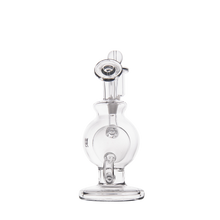 The MJ Arsenal Atlas Mini Dab Rig, made of clear borosilicate glass with a round chamber, vertical neck, cylindrical base, and looped handle features multiple honeycomb percolators and is photographed against a white background.