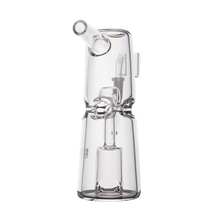 The MJ Arsenal Turret Mini Dab Rig is a clear borosilicate glass rig featuring a bent mouthpiece and a decorative glass ring around the center, displayed against a plain white background.