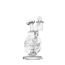 The MJ Arsenal Royale Mini Dab Rig, made of clear borosilicate glass with a round base, upright neck, cylindrical chamber, and fab egg percolator, is shown against a plain white background.