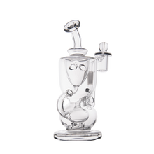 The MJ Arsenal Titan Mini Dab Rig, made of clear borosilicate glass with multiple chambers and curved tubes in an intricate design, is displayed upright on a plain white background.