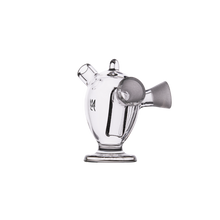 The MJ Arsenal Dubbler Original Double Bubbler is a clear borosilicate glass water pipe with a wide base, angled mouthpiece, and side bowl attachment for optimal water filtration, shown on a plain white background.
