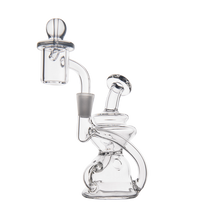 The MJ Arsenal Hydra Mini Dab Rig, made of clear glass with a rounded base, angled mouthpiece, attached banger, and bubble carb cap, is shown on a plain white background.