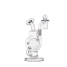 The MJ Arsenal Atlas Mini Dab Rig is a compact piece crafted from durable borosilicate glass, with a rounded base, angled mouthpiece, and a quartz banger, all displayed on a plain white background.
