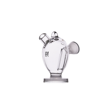 The MJ Arsenal Martian Original Blunt Bubbler is a clear glass piece with two angled top openings and a round, sturdy base for efficient water filtration, shown against a plain white background.