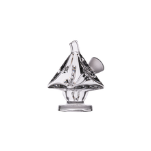 The MJ Arsenal King Bubbler is a clear borosilicate glass piece shaped like a small pyramid with a short, angled mouthpiece and round base, designed for smooth water filtration. It is shown against a plain white background.