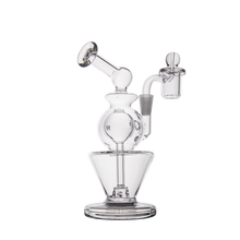 The MJ Arsenal Gemini Mini Dab Rig, crafted from borosilicate glass with a round chamber, angled mouthpiece, and cylindrical attachment on a sturdy base, is pictured against a white background—ideal for portable dabbing.