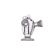The MJ Arsenal Dubbler Original Double Bubbler is a compact, clear borosilicate glass piece with a rounded body, side spout, and wide base—perfect for smooth water filtration, shown against a plain white background.
