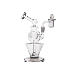 The MJ Arsenal Gemini Mini Dab Rig is a clear borosilicate glass water pipe with a round chamber, angled neck, and attached bowl piece, shown on a white background—perfectly portable for any session.