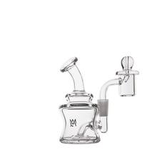 The MJ Arsenal Jammer Mini Dab Rig, made from clear borosilicate glass with a bent neck and cylindrical base, features a side chamber and removable right-side dome, shown on a white background.