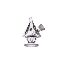 The MJ Arsenal King Bubbler is a clear borosilicate glass piece shaped like a sailboat with a small base and angled side attachment, designed for smooth water filtration, shown against a plain white background.