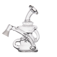 The MJ Arsenal Hydra Vape Edition is a clear glass mini dab rig with a cylindrical chamber, curved neck, and angled mouthpiece for splash-resistant vaping or smoking, pictured on a plain white background.