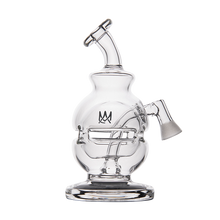 The MJ Arsenal Royale Vape Edition is a clear glass water pipe with a round base, angled mouthpiece, side bowl, and a crown logo—ideal for fans or as a sleek dab rig alternative.