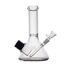 The MJ Arsenal Cache Bong is a clear borosilicate glass beaker-style piece with a straight neck, black mouthpiece ring, and removable downstem and bowl, shown against a plain white background.