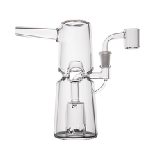 The MJ Arsenal Turret Mini Dab Rig features clear borosilicate glass, a cylindrical base, straight neck, side mouthpiece, and right-facing quartz banger attachment. It's a sleek, portable rig shown against a plain white background.