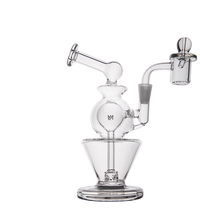 The MJ Arsenal Gemini Mini Dab Rig features clear borosilicate glass, a curved mouthpiece, rounded central chamber, and angled banger on a wide base—ideal as a portable dab rig for any session.