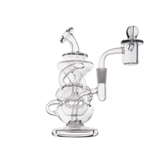 The MJ Arsenal Infinity Mini Dab Rig is a clear borosilicate glass water pipe featuring a swirling twisted chamber and side arm to a domed bowl, elegantly displayed on a white background.