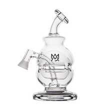 The MJ Arsenal Royale Vape Edition is a clear glass dab rig with a round base, angled mouthpiece, and front logo, ideal for smoking or vaporizing, shown against a plain white background.