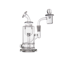 The MJ Arsenal Ursa Mini Dab Rig is a clear borosilicate glass water pipe with multiple chambers, a curved mouthpiece, domed top, detachable bowl, and flat base, shown standing upright against a white background.