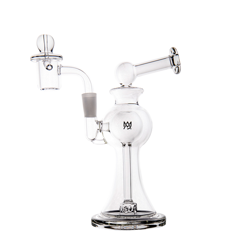 The MJ Arsenal Apollo Mini Dab Rig, made of clear borosilicate glass with a round base, angled mouthpiece, and side-mounted bowl attachment, stands upright against a plain white background for optimal flavor preservation.