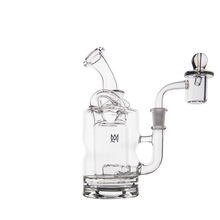 The MJ Arsenal Turbine Mini Dab Rig features clear borosilicate glass, a bent mouthpiece, cylindrical chamber, and Inception Turbine Perc for smooth hits. It includes a quartz banger with carb cap and boasts a modern design on white background.