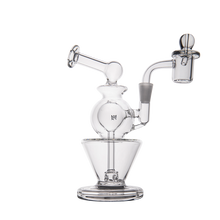 The MJ Arsenal Gemini Mini Dab Rig features clear borosilicate glass, a round central chamber, angled mouthpiece, and side arm for a removable bowl, displayed against a plain white background.