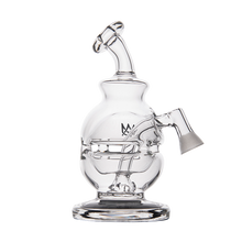 The MJ Arsenal Royale Vape Edition is a clear glass water pipe with a curvy artistic design, wide base, angled mouthpiece, prominent chamber, and small front logo—perfect for use as a dab rig.