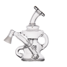 The MJ Arsenal Hydra Vape Edition is a clear glass mini dab rig with a curved neck, side arm, and multiple chambers. It features a gray bowl attachment and splash-resistant design, displayed on a plain white background.