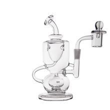 The MJ Arsenal Titan Mini Dab Rig, made of clear borosilicate glass with a curved mouthpiece, round base, and side arm banger attachment, is shown against a plain white background.