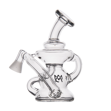 The MJ Arsenal Hydra Vape Edition is a clear glass mini dab rig with a bent mouthpiece, angled downstem, and intricate looping design for smooth hits, shown on a white background.