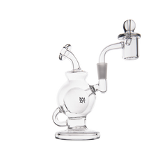 The MJ Arsenal Atlas Mini Dab Rig features clear borosilicate glass with a round base, curved neck, side handle, and attached bowl, presented against a white background.