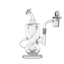 The MJ Arsenal Titan Mini Dab Rig is a clear borosilicate glass rig with a curved design, round base, angled mouthpiece, and side percolator chamber, shown against a plain white background.