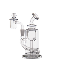 The MJ Arsenal Ursa Mini Dab Rig is a clear borosilicate glass water pipe with a cylindrical chamber, angled mouthpiece, side arm, built-in bowl, and internal percolator—perfect for smoking or vaporizing.