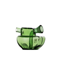 The MJ Arsenal Commander Blunt Bubbler is a green borosilicate glass vessel with a rounded base, short spout, and angled cylinder on top, resembling a mini bubbler, shown against a plain white background.