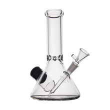The MJ Arsenal Cache Bong, made from clear borosilicate glass in a classic beaker style with a wide base and removable bowl piece, is displayed against a plain white background.