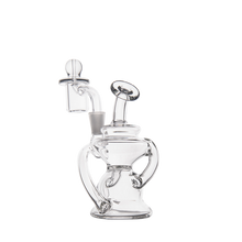 The MJ Arsenal Hydra Mini Dab Rig features clear glass, curved arms, a round base, and an angled mouthpiece for spill-resistant bubbling, shown on a plain white background.