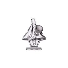 The MJ Arsenal King Bubbler is a clear borosilicate glass water pipe with a sailboat-inspired triangular sail shape and cylindrical mouthpiece, featuring built-in water filtration, shown against a plain white background.