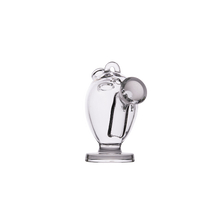 The MJ Arsenal The Martian® Original Blunt Bubbler™ is a clear glass bubbler with a round body, large circular nose, small round ears, and a short cylindrical base—designed for smooth water filtration. Photographed on white.