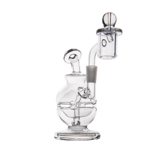 The MJ Arsenal Royale Mini Dab Rig is crafted from durable borosilicate glass with a round base, curved neck, and right-side bowl, designed for vaporizing concentrates and shown against a white background.