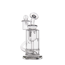 The MJ Arsenal Ursa Mini Dab Rig, made of clear borosilicate glass, features multiple chambers, curved tubing, a removable bowl, and smooth rounded surfaces with precision-cut openings—displayed on a white background.