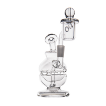 The MJ Arsenal Royale Mini Dab Rig is a clear borosilicate glass piece featuring a round base, angled neck, and an attached cylindrical top chamber, shown against a white background.