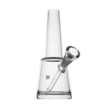 The MJ Arsenal Summit Bong, made of clear borosilicate glass with a cylindrical neck, angled bowl, and flat base, stands upright against a plain white background, highlighting its water filtration bong design.