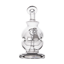 The MJ Arsenal Royale Vape Edition is a clear glass dab rig with a round base, cylindrical neck, and intricate internal percolator, shown against a plain white background.