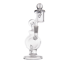 The MJ Arsenal Atlas Mini Dab Rig is a clear borosilicate glass water pipe with a rounded base, vertical neck, and attached bowl, offering a minimalist and durable transparent design for stylish smoking or vaporizing.