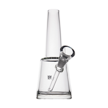 The MJ Arsenal Summit Bong features clear borosilicate glass, a conical neck, slanted bowl, and flat square base—delivering smooth hits with advanced water filtration. Perfect for your sessions against any backdrop.